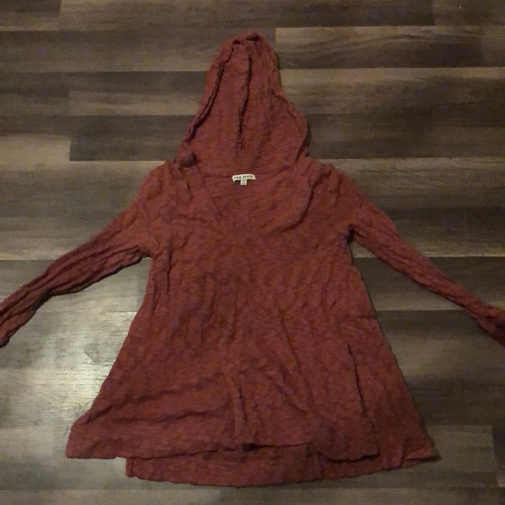 rust/dark orange sweater